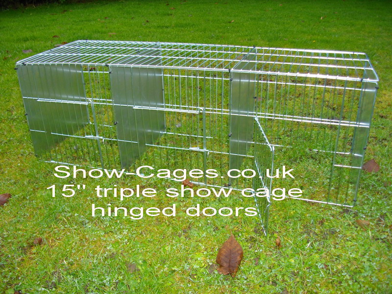 15" show cage triple with hinged  doors and solid divisions